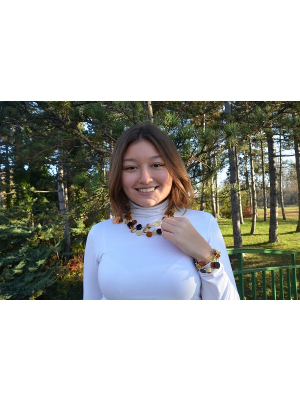 Amber bracelet with gold plated elements